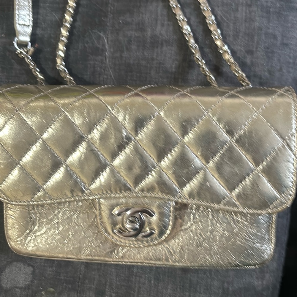 Gently used authentic crinkle gold Chanel bag.
